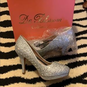 Heels with original packing/box.